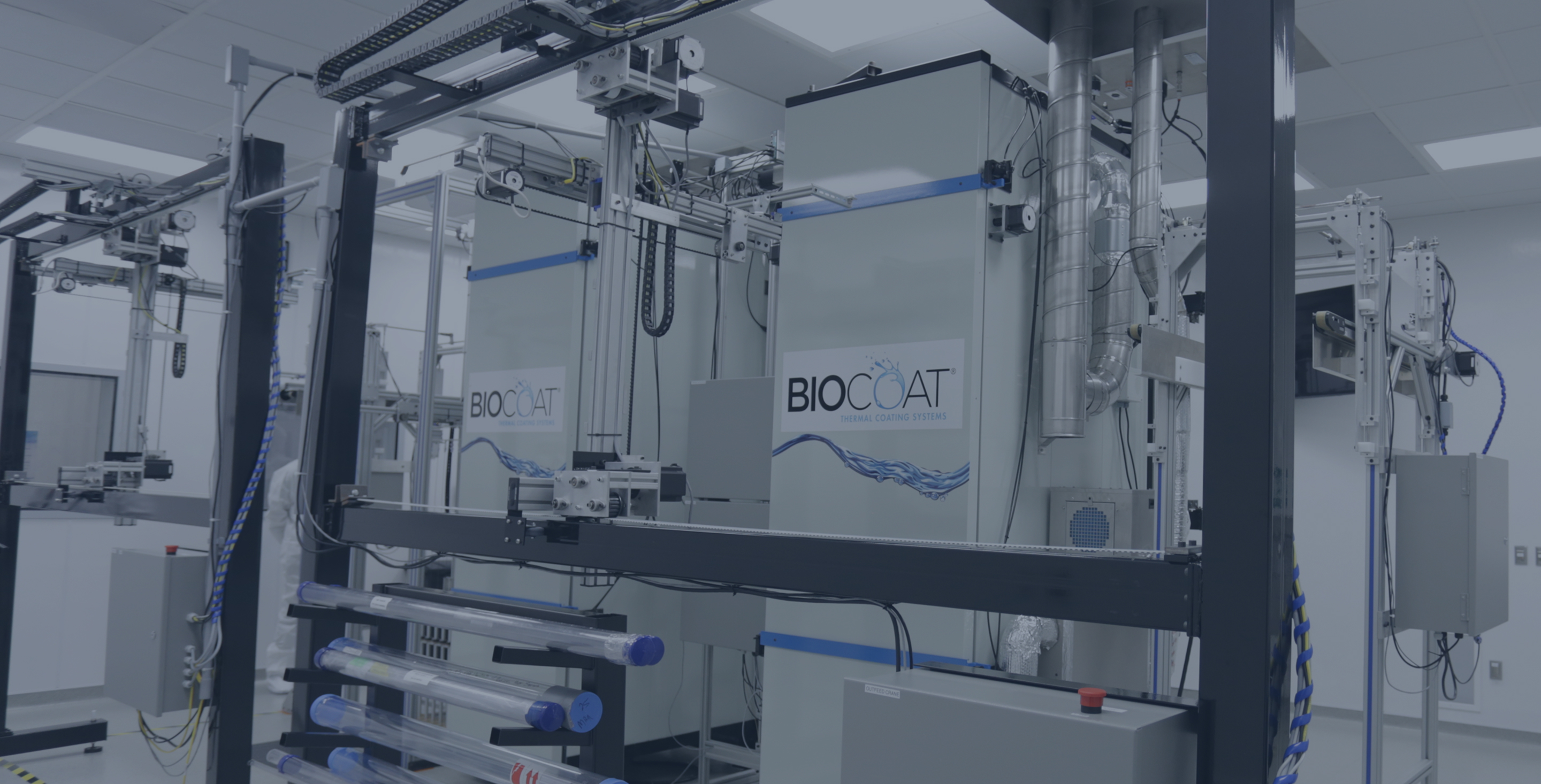 Biocoat thermal coating system on an automated manufacturing line inside a cleanroom.